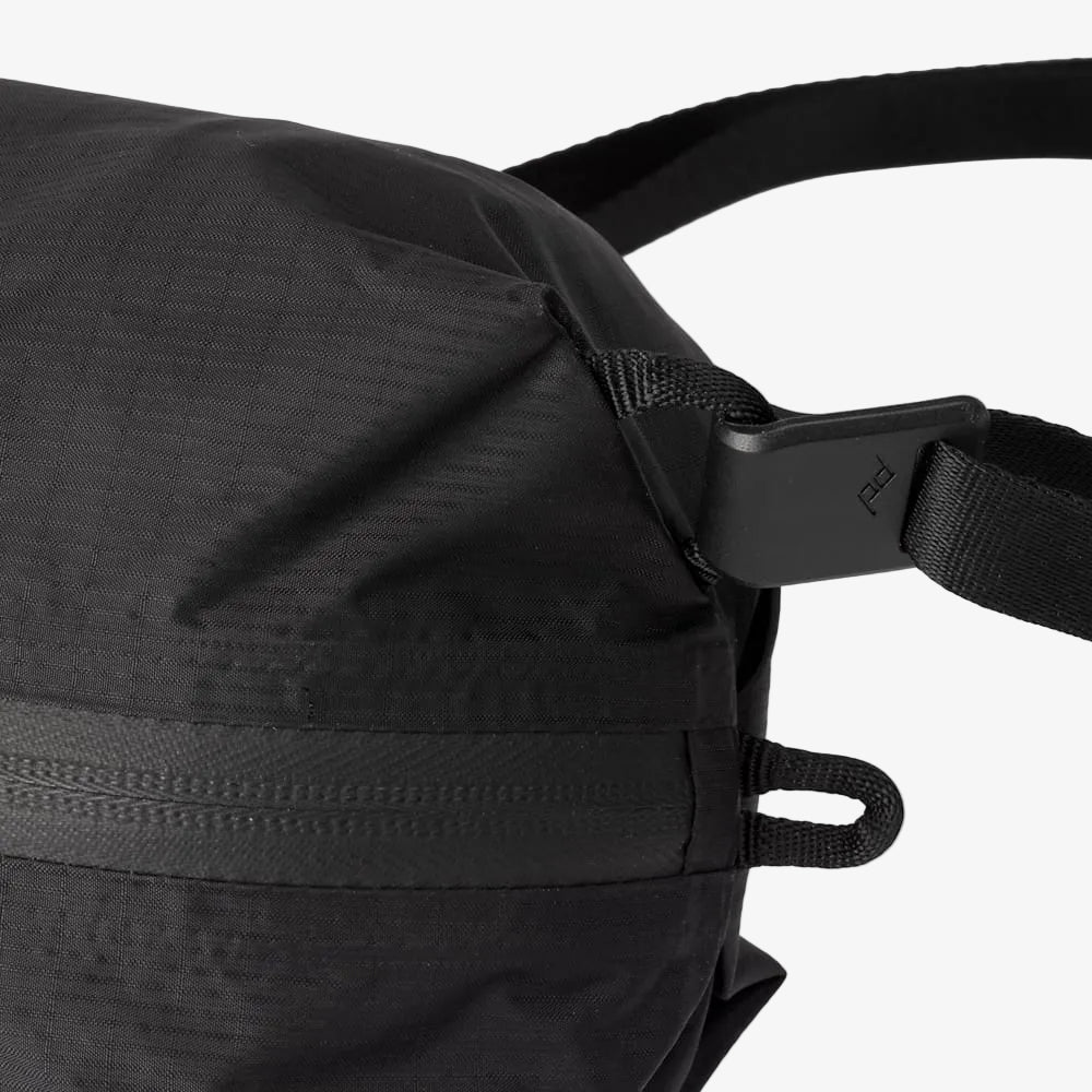 close up of peak design flat hook attached to bag