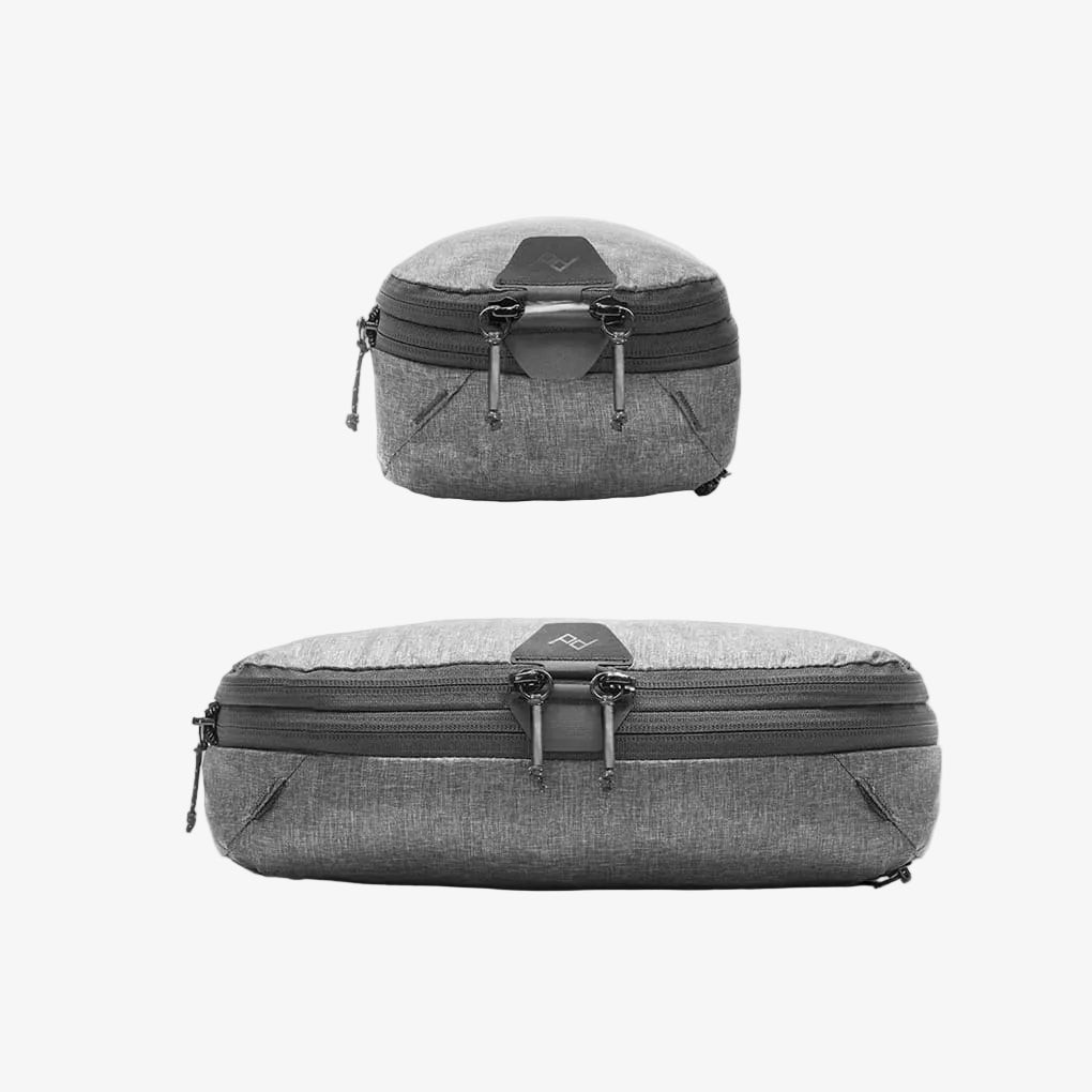 two charcoal peak design small and medium packing cube