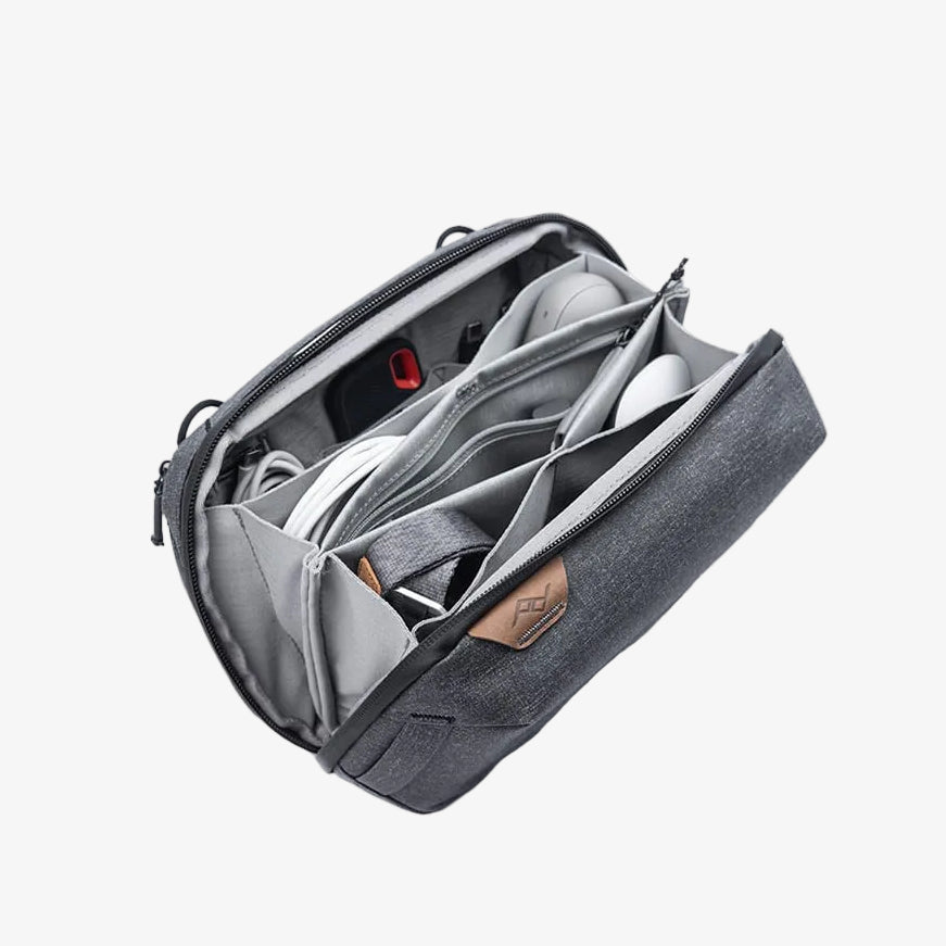 opened charcoal peak design tech pouch