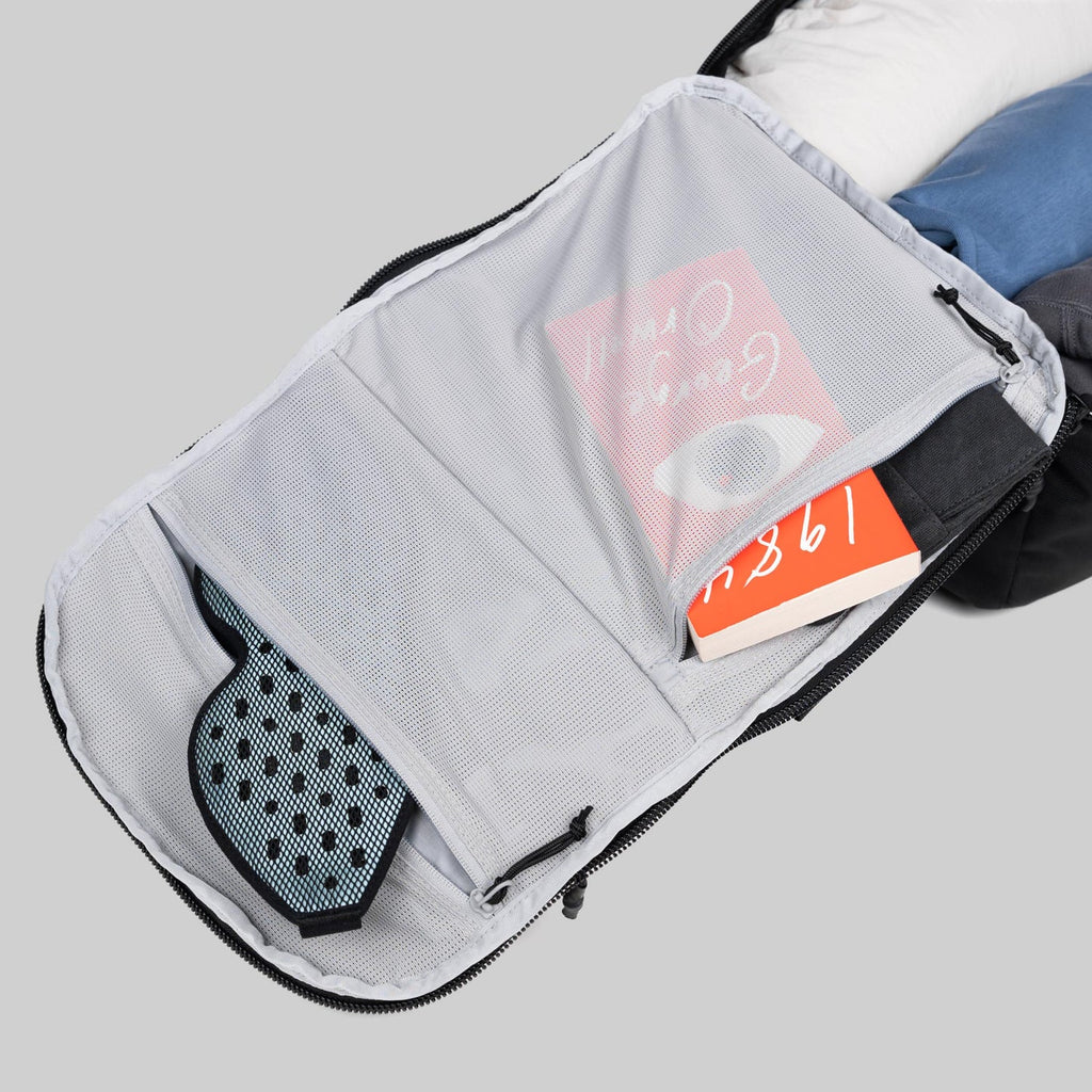rework outbound travel pack 30l flap pockets