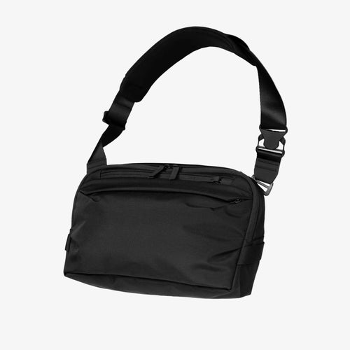 Black Toshi 6-liter shoulder bag with a strap